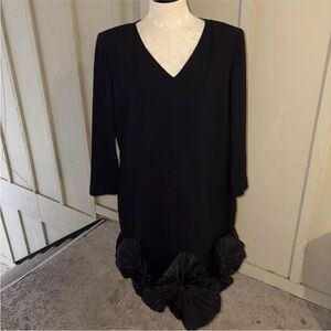 Elegant Black Dress with Unique Hem